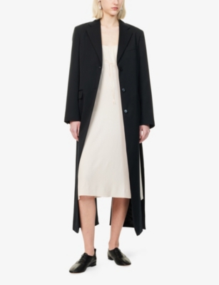 SIMONE ROCHA WOMENS BLACK OPEN-AT-BACK NOTCH-LAPELS RELAXED-FIT WOVEN-BLEND COAT 