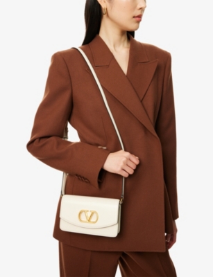 VALENTINO GARAVANI: Vain Small Leather Clutch Bag