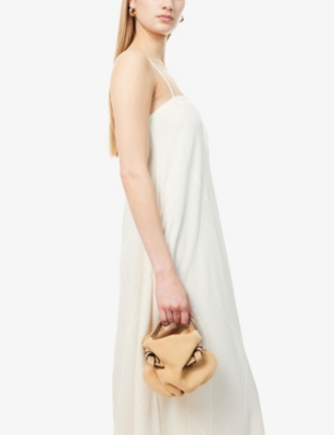NEOUS: Taurus 1.0 Mini Suede Top-Handle Bag