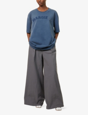 MAISON MARGIELA: Pleated Flared Cotton-Blend Trousers