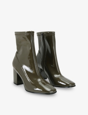 CARVELA: Strut Patent Faux Leather Ankle Boots