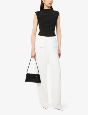 ODD MUSE: The Ultimate Muse Sleeveless Stretch-Woven Top