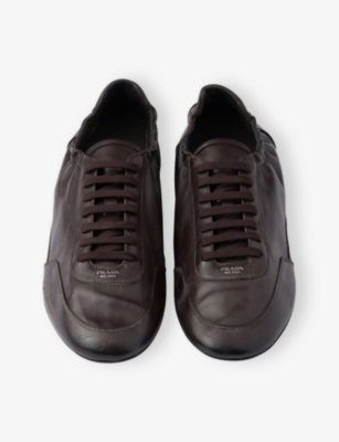 Prada Collapse Leather Sneakers In Black