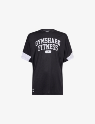 GYMSHARK: Varsity Oversized Woven T-Shirt