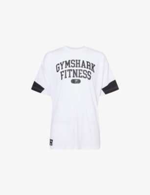 GYMSHARK: Varsity Oversized Woven T-Shirt