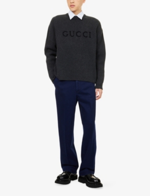 GUCCI: Embossed-Logo Straight-Leg Denim Chino Trousers