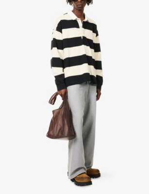 BALENCIAGA: Brand-Embroidery Wide-Leg Denim Jeans