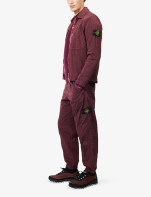 STONE ISLAND: Logo-Badge Relaxed-Fit Shell Trousers