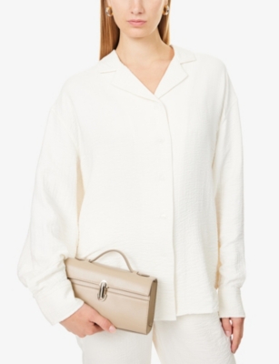SAVETTE: Symmetry Pochette Leather Top Handle Bag