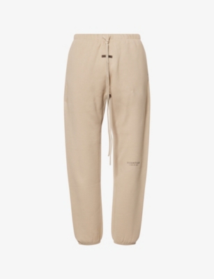Essentials Mens Timber Vintage Logo-embellished Cotton-blend Jogging Bottoms In Brown