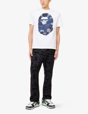 A BATHING APE: Camo Flocked Denim Jeans