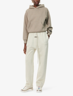 Essentials Womens Heather Stone Relaxed-fit Logo-patch Cotton-blend Jogging Bottoms In White