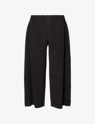 HOMME PLISSE ISSEY MIYAKE: Angular Stone Wide-Leg Knitted Trousers