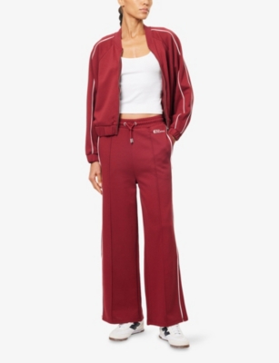 We Are Tala Omens Vintage Red Wide-leg Logo-print Stretch-woven Jogging Bottoms Xs In Red