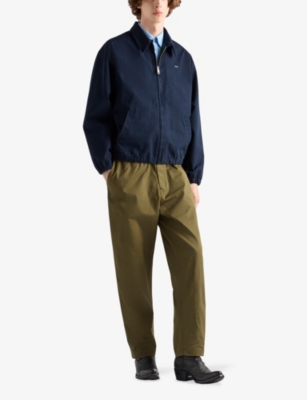 PRADA: Triangle-Appliqué Slim-Fit Cotton Trousers