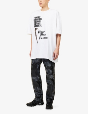 Black Comme Des Garcon Mens Black/grey Printed Straight-leg Faux-leather Trousers In Multi