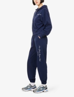 Sporty And Rich Womens Dark Navy Ny Tennis Club Elasticated-cuffs Cotton-jersey Jogging Bottoms Xl In Blue