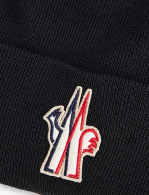 Moncler S Black Logo-embroidered Ribbed Virgin-wool Beanie Hat In Black