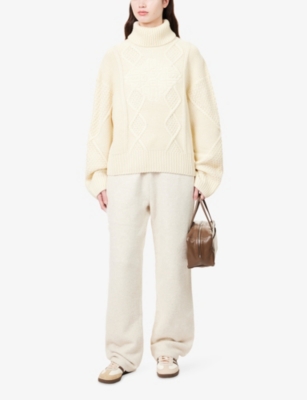 THE COUTURE CLUB: Embossed-Emblem Roll-Neck Knitted Jumper