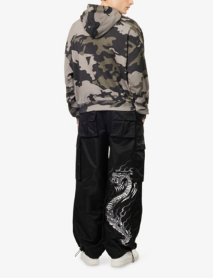 TRAPSTAR: Trapstar x Ed Hardy Flame Embroidered Shell Trousers