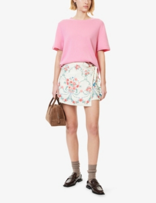 AGUA BY AGUA BENDITA: Luna Mosqueta Wrap Linen Mini Skirt