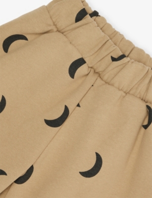 Organic Zoo Dusky Midnight Printed Cotton Traveller Trousers 3 Months - 5 Years Sand/moon Pri In Brown