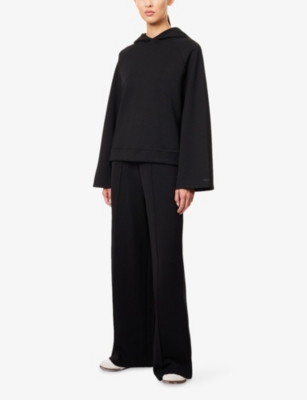We Are Tala Omens Black Softsmart Flared-sleeve Woven Hoody In Blue