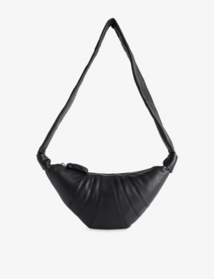 LEMAIRE - Belted Leather Baguette Bag | Selfridges.com