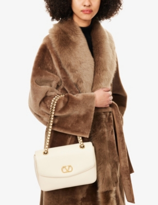Valentino Garavani  Garavani Djuna Medium Chain Bag In Nappa Leather Woman Butter Uni In White